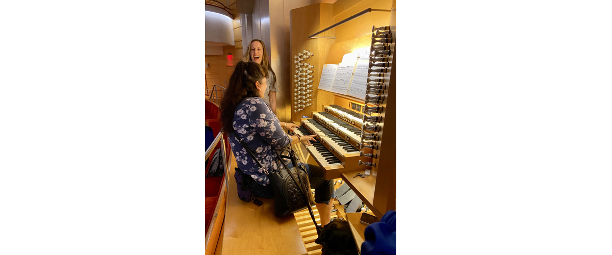 Estee trying out the pipe organ